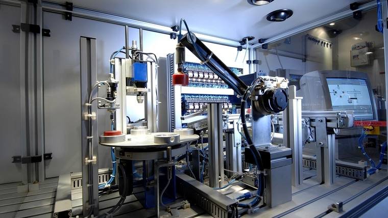 Industrial injection moulding machinery in operation